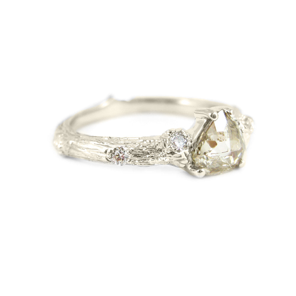 Small Twig ring in 18k white gold with a rose-cut diamond and diamonds.