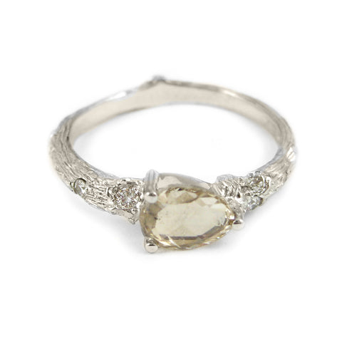 Small Twig ring in 18k white gold with a rose-cut diamond anddiamonds.